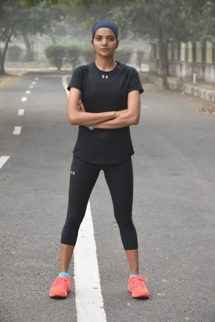 SufiyaSufi runner running on a mountain road